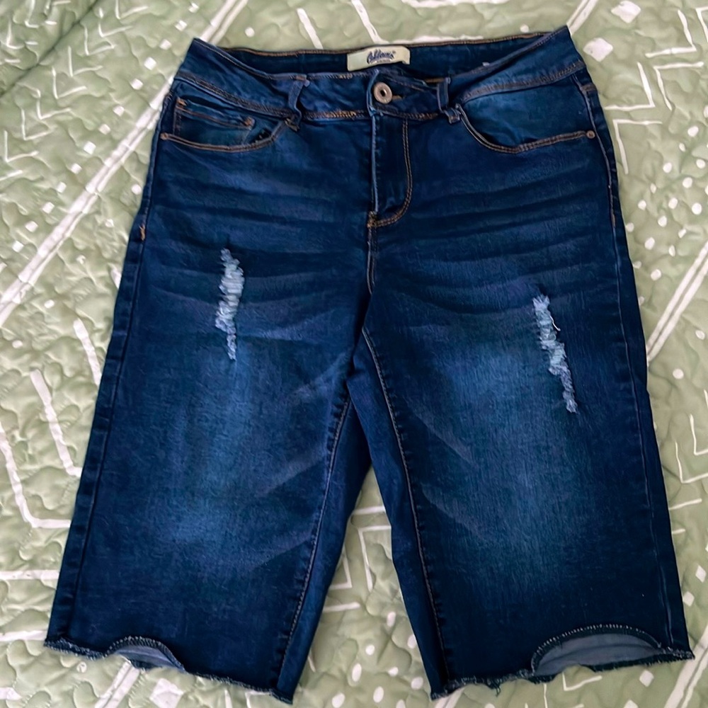 Fitted long jean shorts. Worn a couple of times. These can be rolled up or cut